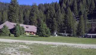 Lodge with Owner Tom's plane 