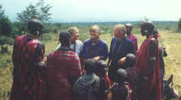 Women dress Julia, Care, and Havan in Masai jewelry