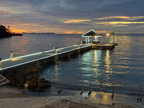 Pulau Pacific Resort dock at sunset